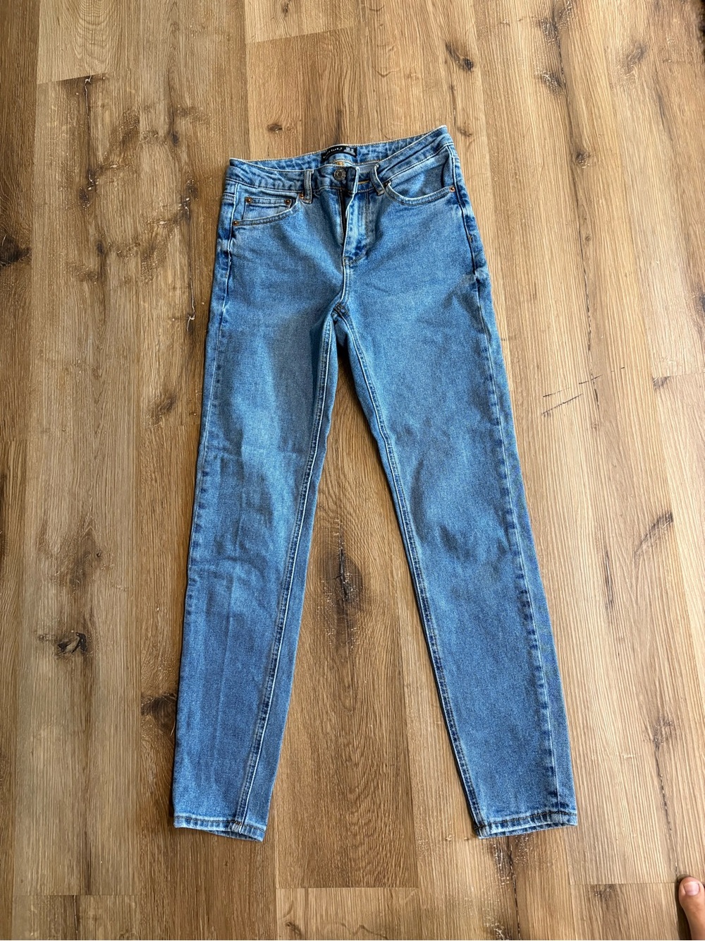 Black Tape_ High-Rise Skinny Jeans in Light Blue